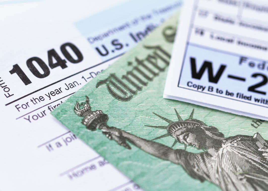 Close up of tax forms and a check from the US treasury.