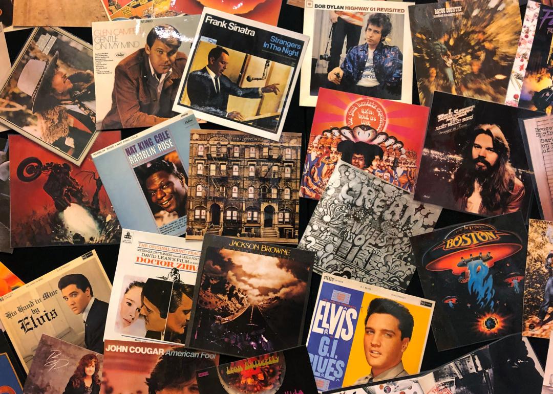A collection of famous rock and jazz albums, including Elvis, Frank Sinatra, Boston, and Bob Dylan, among others.