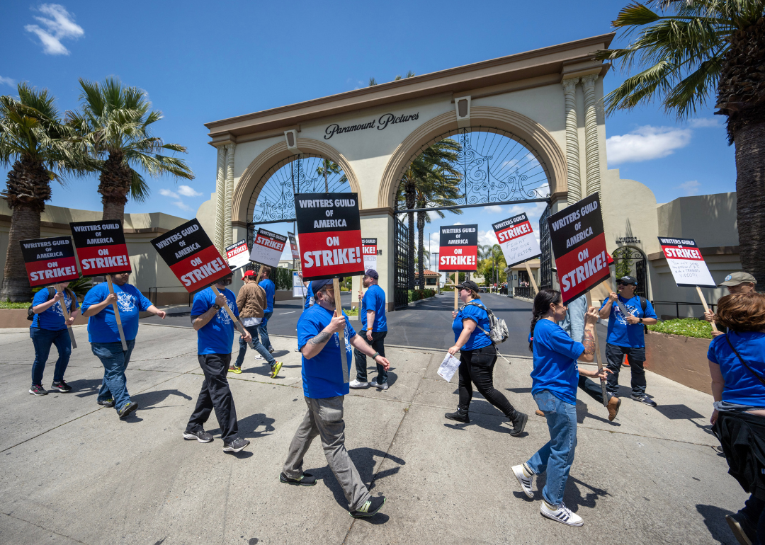 People picket outside of Paramount Pictures in Los Angeles during the first day of the Writers Guild of America strike on Tuesday, May 2, 2023.