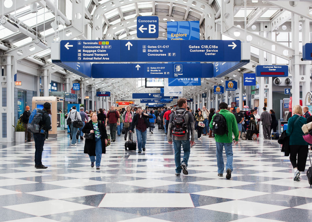 Travelers make their way through a terminal at Chicago's O'Hare airport.