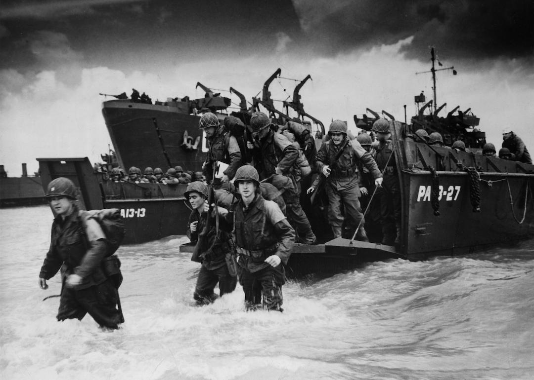 Reinforcements disembarking from a landing barge at Normandy during the Allied Invasion of France on D-Day.