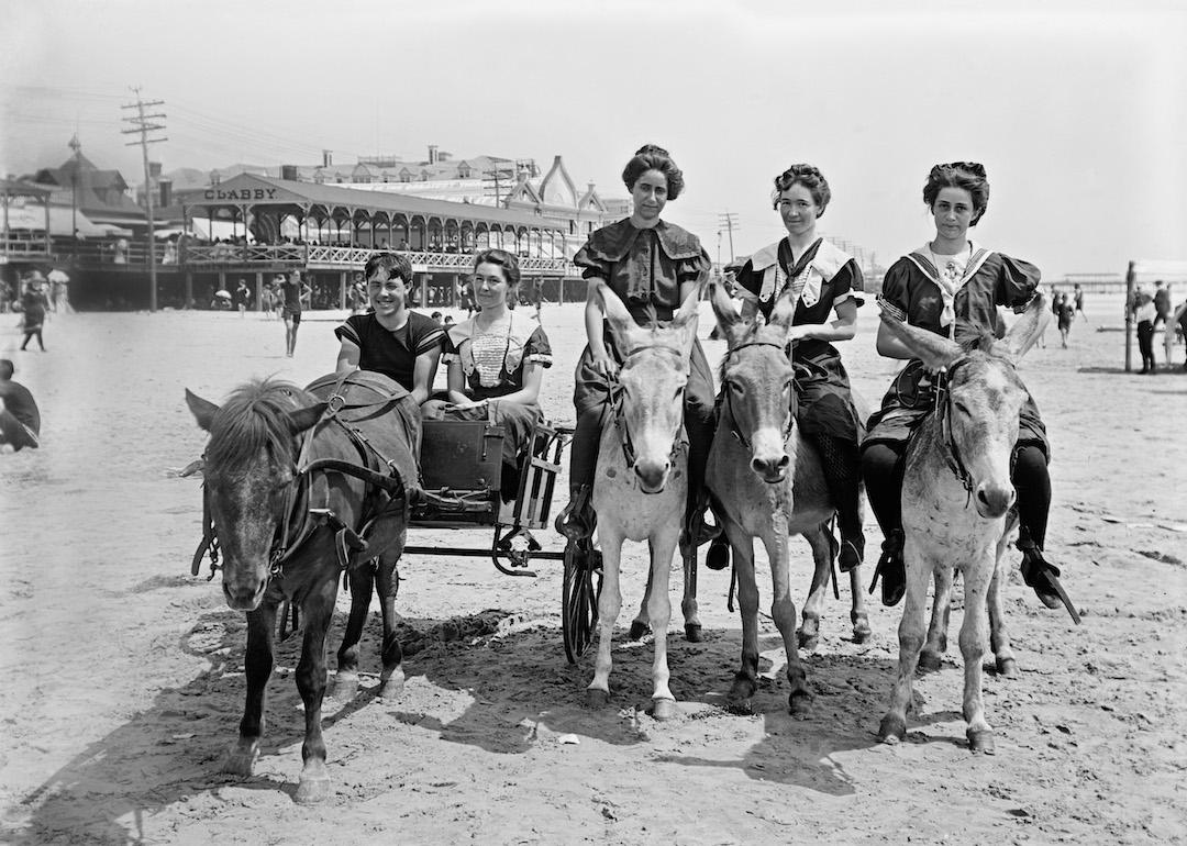 Pony cart and donkeys on the beach in Atlantic City, New Jersey at the turn of the 20th century.
