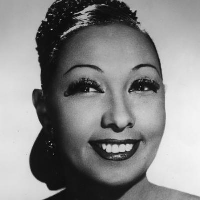 Portrait of singer Josephine Baker, in a strapless dress, in France in 1949.