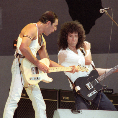 Freddie Mercury and Brian May from the band Queen performing live on stage at the Live Aid concert, Wembley Stadium, 1985