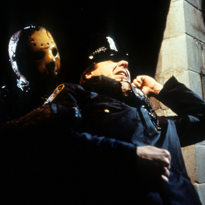 Jason grabs cop in a scene from the film 'Friday The 13th Part VIII: Jason Takes Manhattan', 1989. 