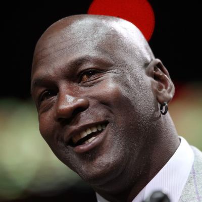 Former player Michael Jordan of the Chicago Bulls addresses the crowd during a 20th anniversary recognition ceremony of the Bulls 1st NBA Championship in 1991 during half-time of a game bewteen the Bulls and the Utah Jazz at the United Center on March 12, 2011 in Chicago, Illinois. 