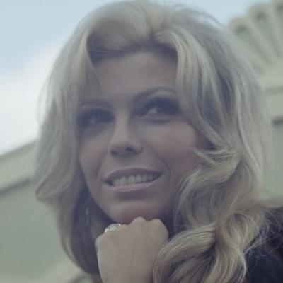 Singer and actor Nancy Sinatra poses at a hotel roof garden in London in 1967.