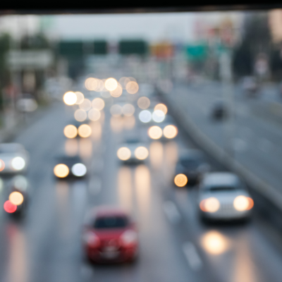 A slightly blurred photo of traffic on a multilane roadway