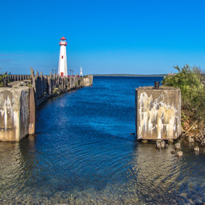 Lighthouse at the end of a pier in St Ignace, Michigan