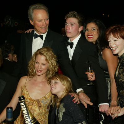 Actor Clint Eastwood and wife Dina Ruiz (R) pose with family and friends during the 9th Annual Screen Actors Guild Awards at the Shrine Auditorium on March 9, 2003 in Los Angeles, California. 