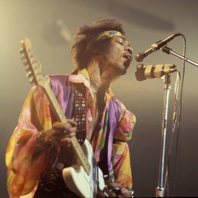 Jimi Hendrix performs live on stage with a white Fender Stratocaster guitar with The Jimi Hendrix Experience at the Royal Albert Hall in London on Feb. 24, 1969.