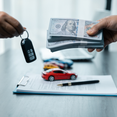 A cash handover for a car purchase