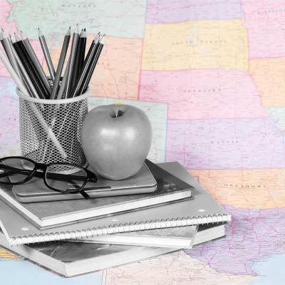 photo illustration U.S map with grayscale teaching materials placed on topced 