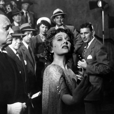 Erich von Stroheim (1885 - 1957, left) as Max von Mayerling, and Gloria Swanson (1899 - 1983) as Norma Desmond in the final scene of 'Sunset Boulevard', directed by Billy Wilder, 1950. 