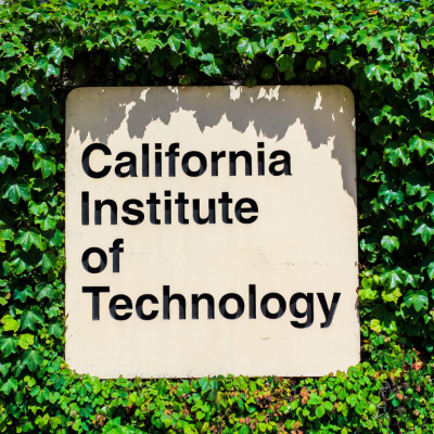 A sign for the California Institute of Technology imbedded in a wall of green ivy