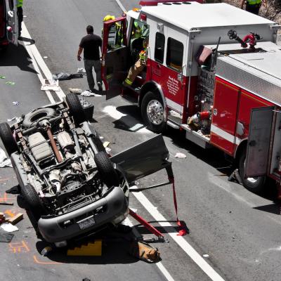 The scene of a traffic accident in Monterey, California, involving an overturned SUV.