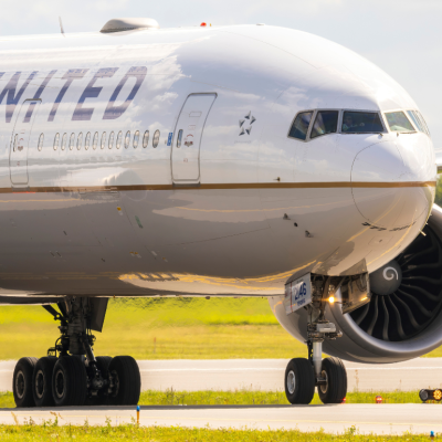 A United Airlines Boeing 777 on an airport runway in Lithuania