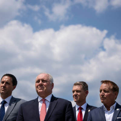 Secretaries of state such as Frank LaRose of Ohio (left), Wes Allen of Alabama (center right), and Paul Pate of Iowa (right) led their states to depart from the ERIC program for cross-state voter roll cleaning. Also pictured is U.S. House Majority Leader Steve Scalise of Louisiana (center left) at a news conference in July in Washington, D.C. 