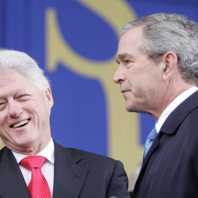 Former US President George W. Bush (R) stands with former US President Bill Clinton (L) at the ceremonial groundbreaking of the Martin Luther King Jr. National Memorial 13 November, 2006 on the National Mall in Washington, DC. 