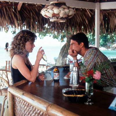 Elisabeth Shue visits Tom Cruise as he bartends in a scene from the film 'Cocktail', 1988. 