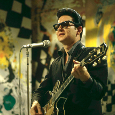 American singer, guitarist and musician Roy Orbison (1936-1988) performs on a television show in England circa 1965. 