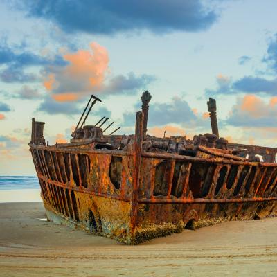 Maheno shipwreck at sunset on Fraser Island in Queensland, Australia.