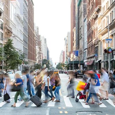 anonymous people walking in New York city street with motion blur, concept of average person