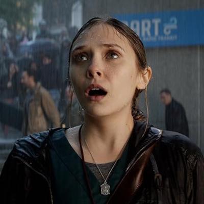 Elizabeth Olsen in the 2014 movie Godzilla, now trending on Max.
