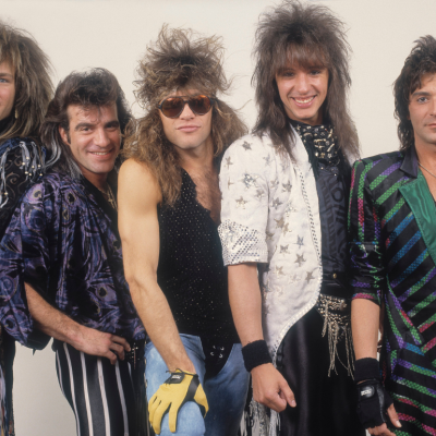 Portrait of American rock band Bon Jovi backstage before a performance, Illinois, early March, 1987. Pictured are, from left, David Bryan, Tico Torres, Jon Bon Jovi, Richie Sambora, and Alec John Such.
