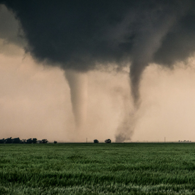 A pair of tornadoes take a destructive path through northern Oklahoma farmyards.
