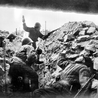 Russian soldiers hiding in and firing artillery from their bunker during the World War II, the Battle of Stalingrad, circa 1942.