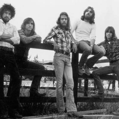 Don Henley, Joe Walsh, Bernie Leadon, Glenn Frey, and Randy Meisner of the rock band The Eagles pose for a portrait in circa 1976.