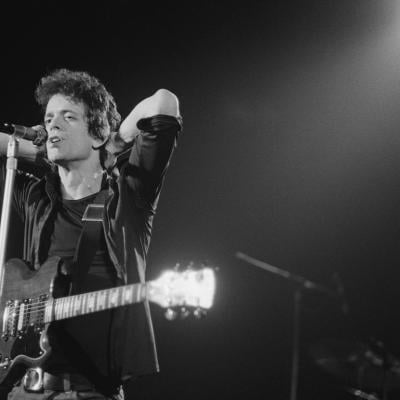Singer-songwriter Lou Reed performing at the Hammersmith Odeon in 1975.