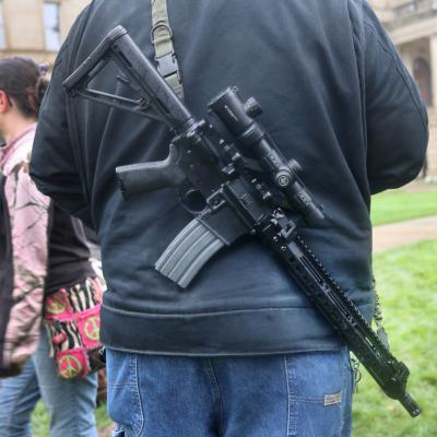 Gun rights activists gather for a rally at the Michigan State capital building in Lansing, Michigan.