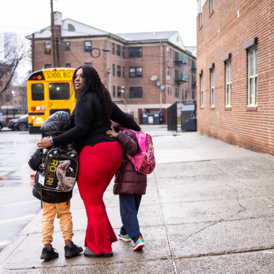 Hannah Allen, who goes to Hudson County Community College, with two of her children at the end of a day, on the way to pick up the third.