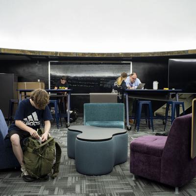 Students complete work during a finance class held in the planetarium inside of Valley High School in New Kensington, PA