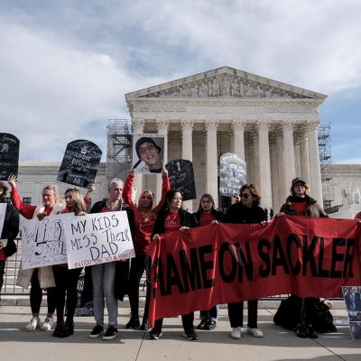 Protesters gather outside of the U.S. Supreme Court on December 4, 2023 in response a nationwide settlement with Purdue Pharma, the manufacturer of OxyContin.