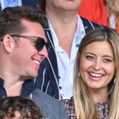 Nick Candy and Holly Valance laugh as they attend Wimbledon 2022 in London, England.