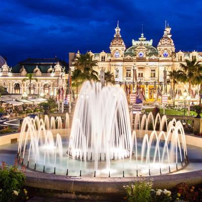 The Monte Carlo Casino, a gambling and entertainment complex in Monte Carlo, Monaco, Cote de Azul seen at twilight.