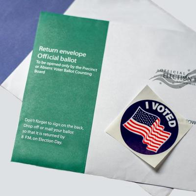 Official U.S. ballot return envelopes and "I voted" sticker for U.S. election. 