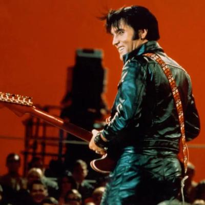 Rock and roll musician Elvis Presley performing on the Elvis comeback TV special on June 27, 1968.