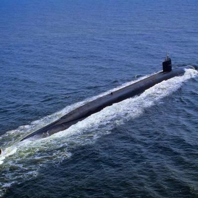 USS Pennsylvania United States Navy Nuclear Powered Ohio-Class Ballistic Missile Submarine Cruising On Ocean Surface.