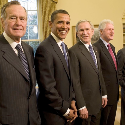 Former Presidents George H.W. Bush, Barack Obama, George W. Bush, Bill Clinton, and Jimmy Carter pose together in the Oval Office on Jan. 7, 2009 at the White House.