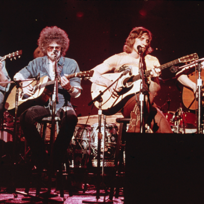 Members of the American soft-rock ensemble The Eagles sit on chairs as the perform on the television show 'Don Kirschner's Rock Concert,' 1979. Bandmembers are (left to right) Glenn Frey, Don Henley, Joe Walsh, and Don Felder. 