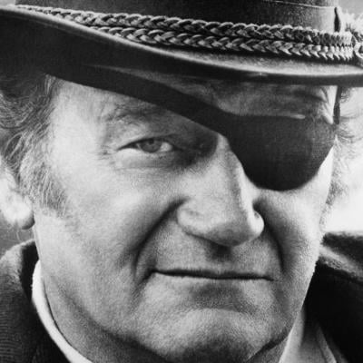 John Wayne as Rooster Cogburn in a scene from the 1969 movie 'True Grit.'