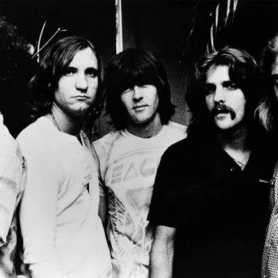 Don Henley, Joe Walsh, Randy Meisner, Glenn Frey, and Don Felder of The Eagles in 1976.