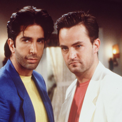 David Schwimmer and Matthew Perry dress up in Miami Vice outfits in the "Friends" Thanksgiving special, "The One With Thanksgiving Flashbacks."