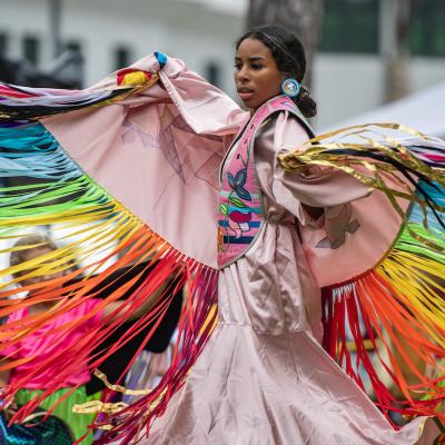 Indigenous person dances during the inter tribal dance at the 103rd Annual Mashpee Wampanoag Pow Wow in Mashpee, Massachusetts on July 5, 2024.