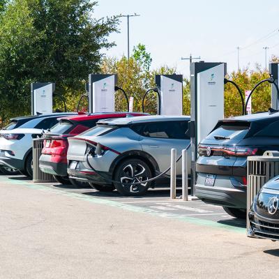 An Electrify charging station in Austin, TX where many EV cars are charging.