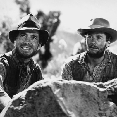  Actors Humphrey Bogart and Tim Holt pose for a publicity still for the Warner Bros/First National film 'The Treasure of the Sierra Madre' in 1948. 